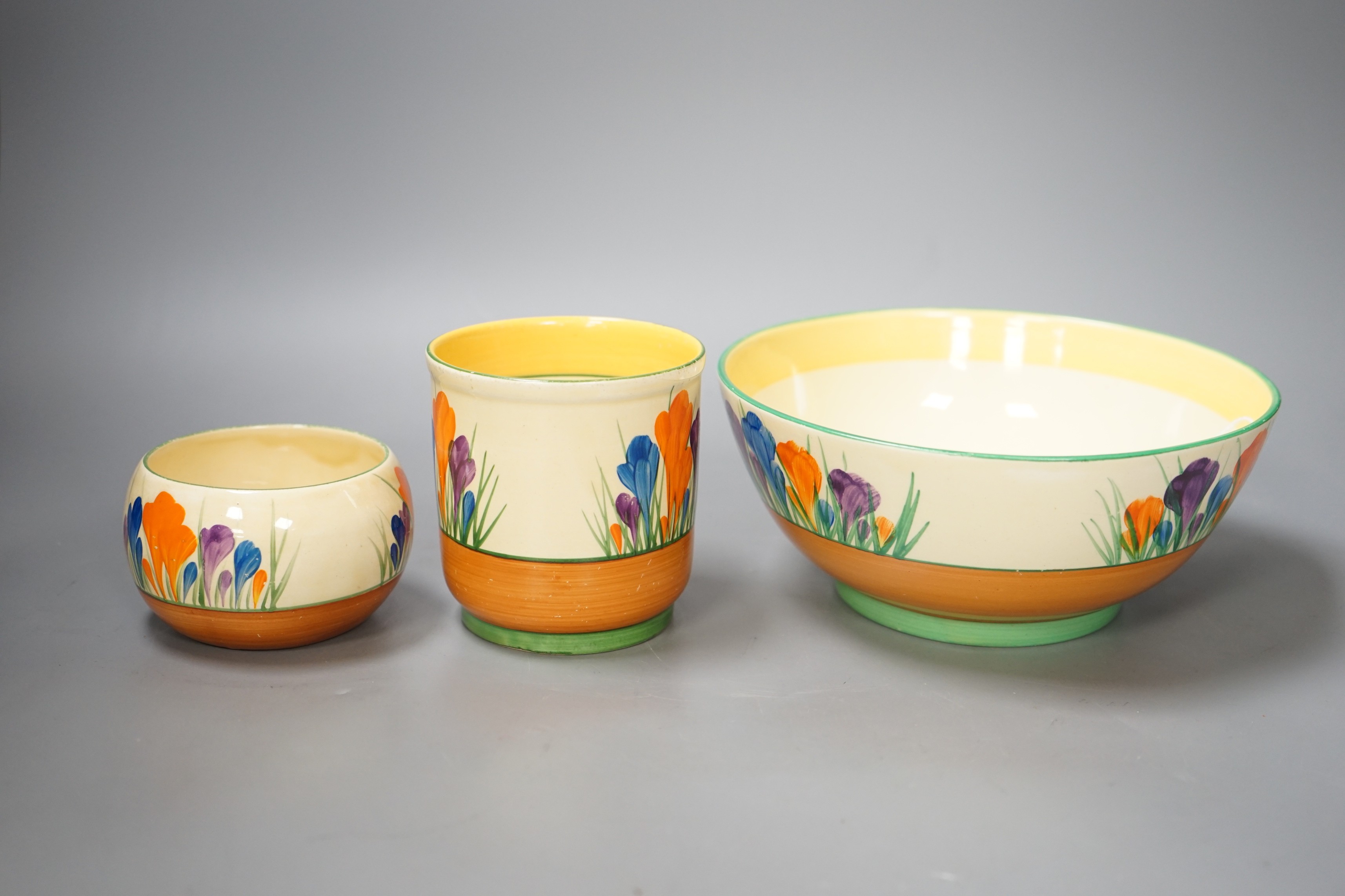 Three pieces of Clarice Cliff Crocus pattern, largest 19cm diameter